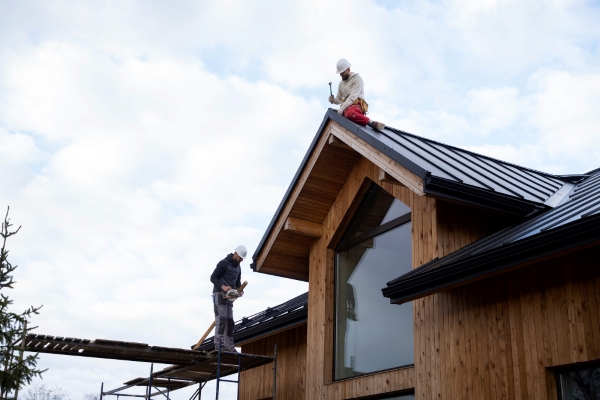 An image of men working on an emergency roof repair